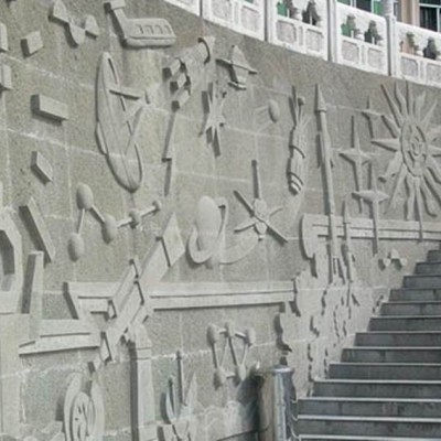 重庆青石浮雕案例 地下通道楼梯墙面青石浮雕装饰应用